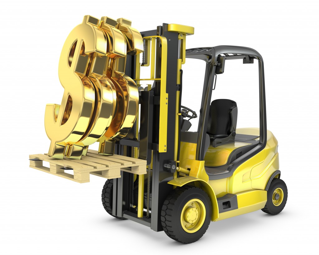 Fork lift truck lifts gold dollar sign